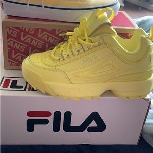 Yellow filas size 6 woman’s. Lightly worn